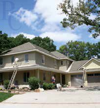 airless spray-painting two-story house