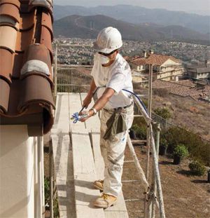 airless spraying exterior stucco house