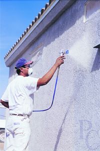 airless spray-painting two-story house